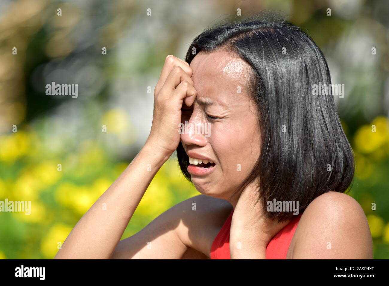 Stressed Attractive Filipina Woman Stock Photo