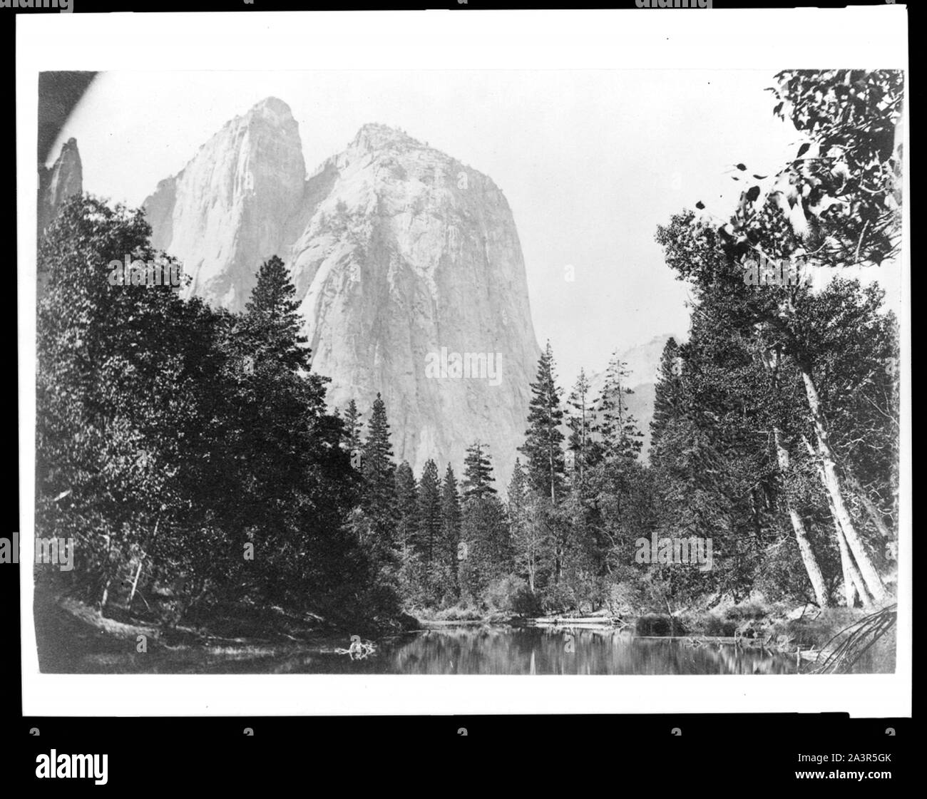 Stream and trees with mountain in background, Yosemite National Park, Calif. Stock Photo