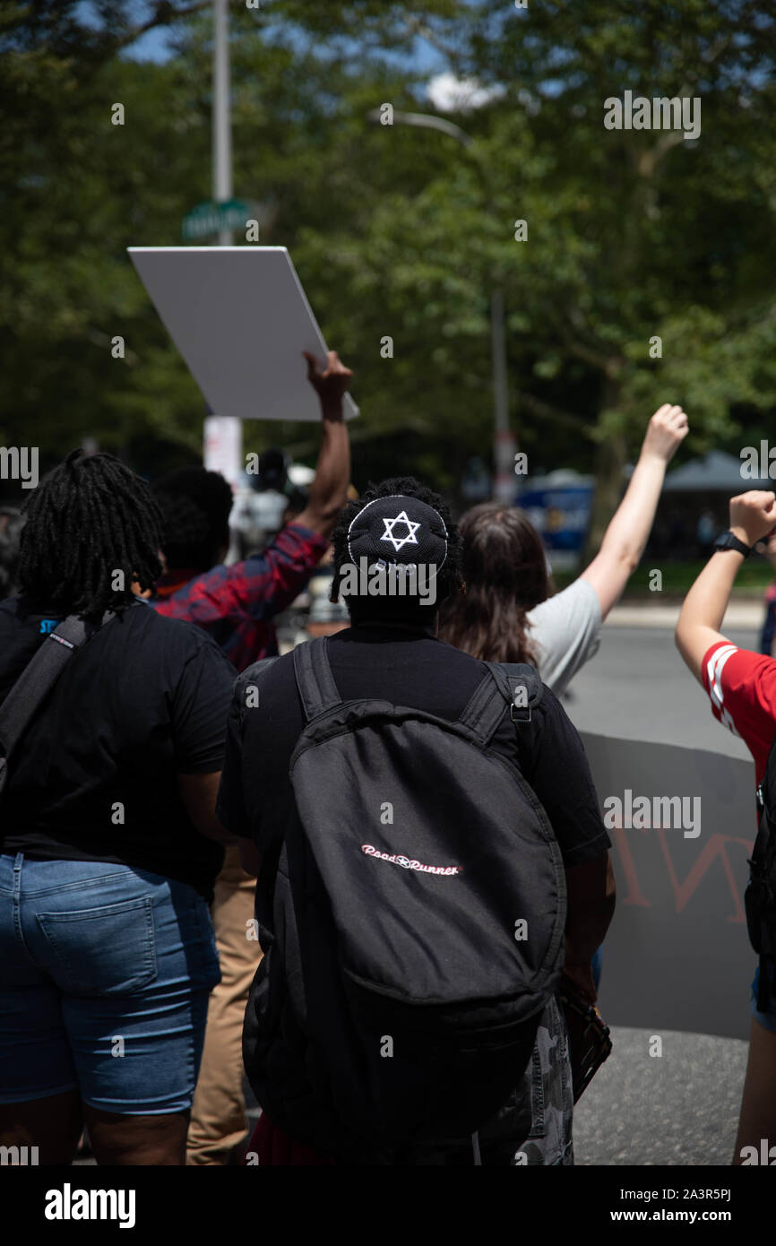 Philadelphia, PA/USA - July 12, 2019: Activists in Philadelphia march on immigration and customs enforcement as part of a nationwide day of action in protest of conditions at migrant detention centers Stock Photo