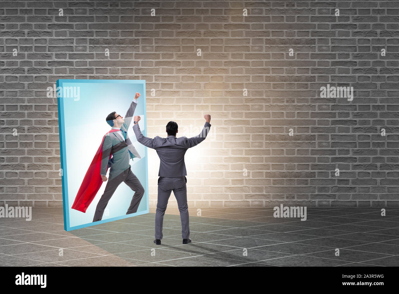 The businessman seeing himself in mirror as superhero Stock Photo - Alamy