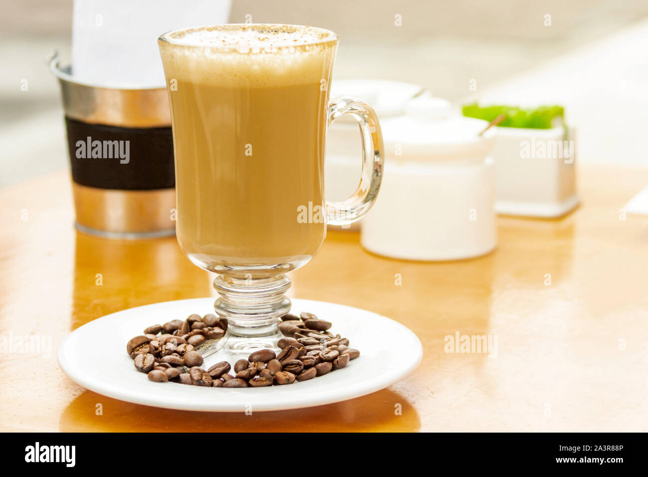 Enjoying coffee with milk and dessert Stock Photo