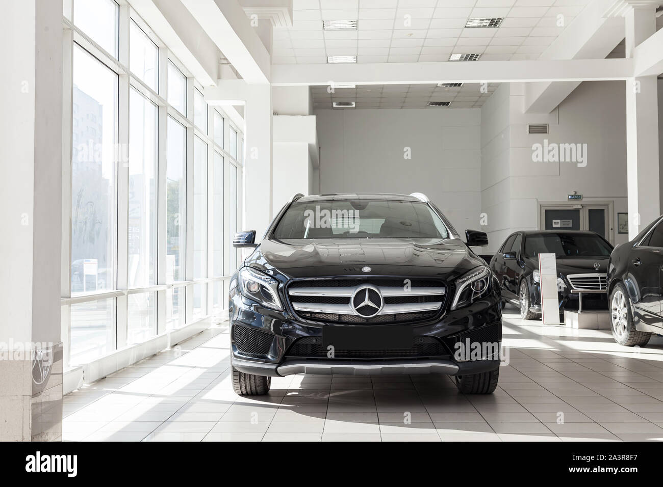 Novosibirsk, Russia - 08.01.2018: Black Mercedes Benz Gla class 2016 year front view with dark gray interior in excellent condition in a dealership wi Stock Photo