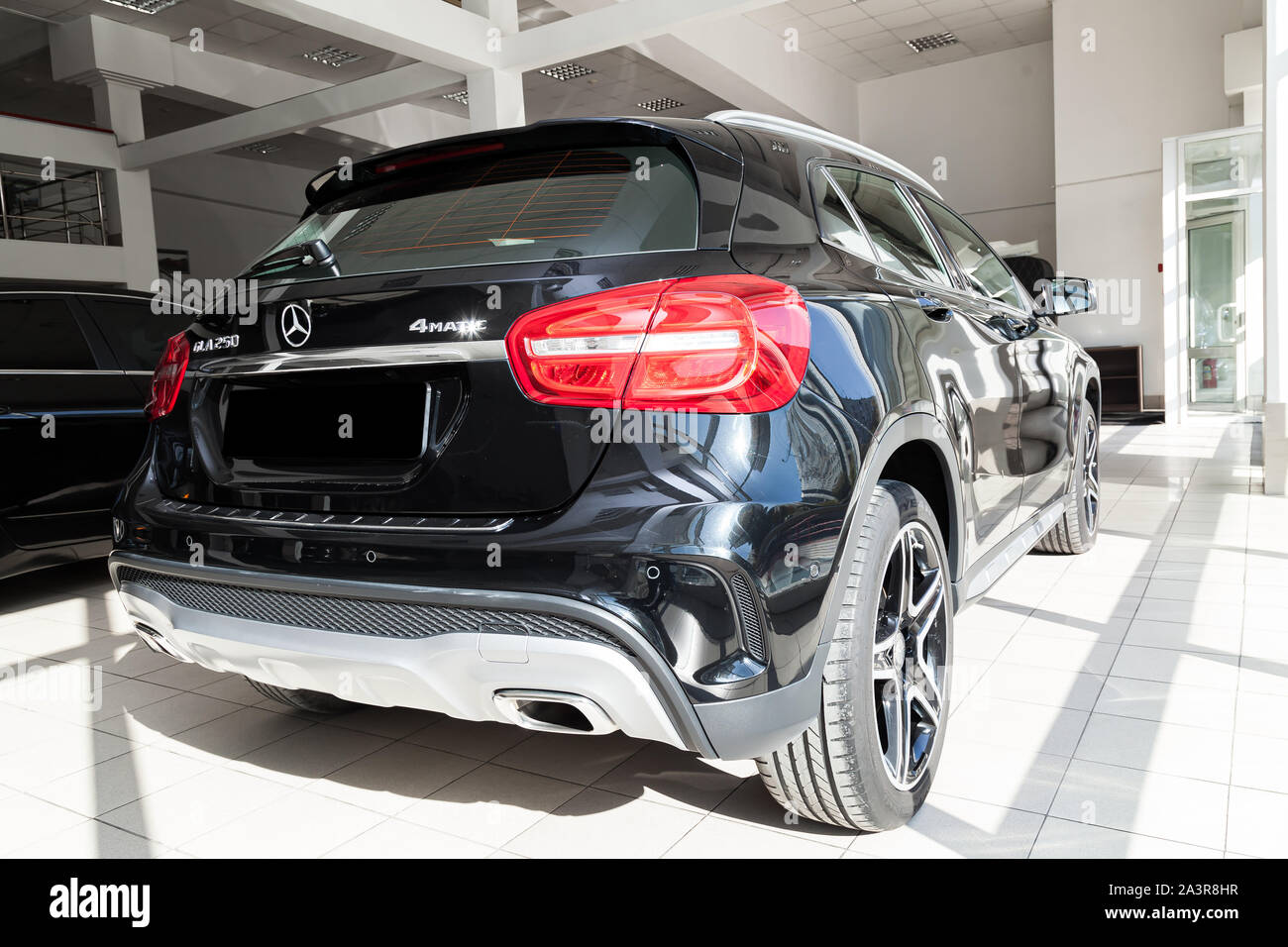 Novosibirsk, Russia - 08.01.2018: Black Mercedes Benz Gla class 2016 year rear view with dark gray interior in excellent condition in a dealership wit Stock Photo