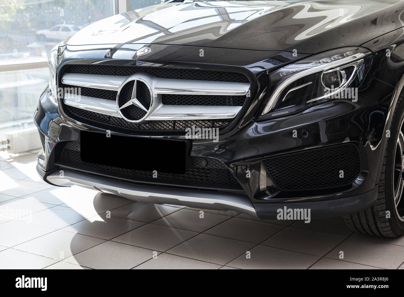 Novosibirsk, Russia - 08.01.2018: Black Mercedes Benz Gla class 2016 year front view with dark gray interior in excellent condition in a dealership wi Stock Photo