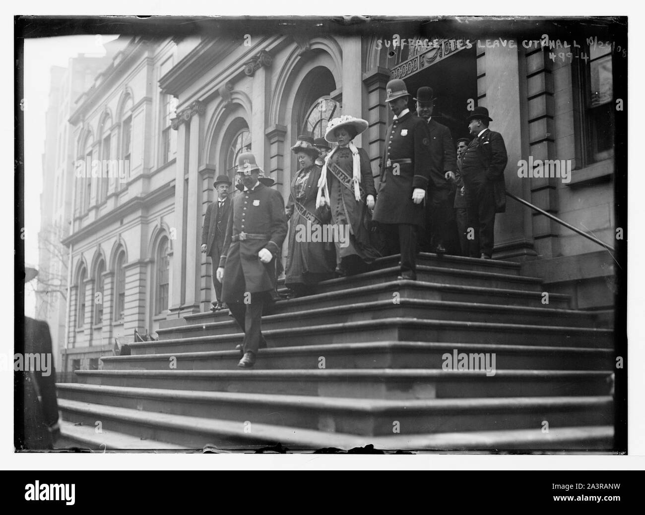 Suffragettes leave City Hall [with police, New York] Stock Photo