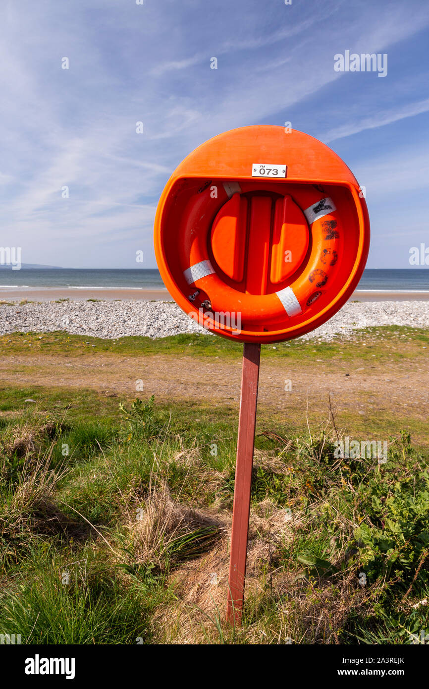 Lifebelt on the foreshore at Llanddona beach, Anglesey, North Wales Stock Photo