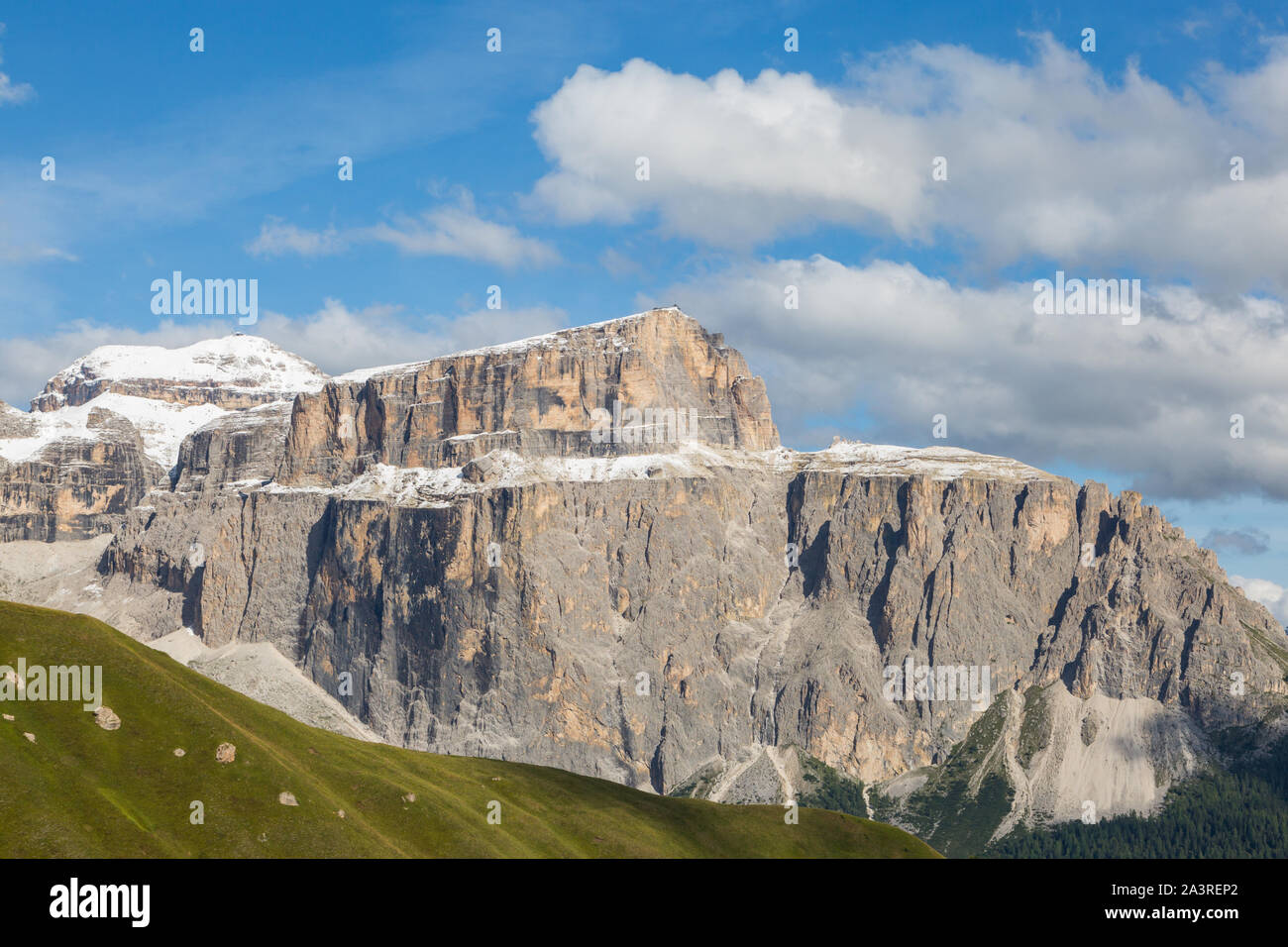 snow-capped Piz Boe mountain of Sella group in  Dolomites, cloudy blue sky Stock Photo