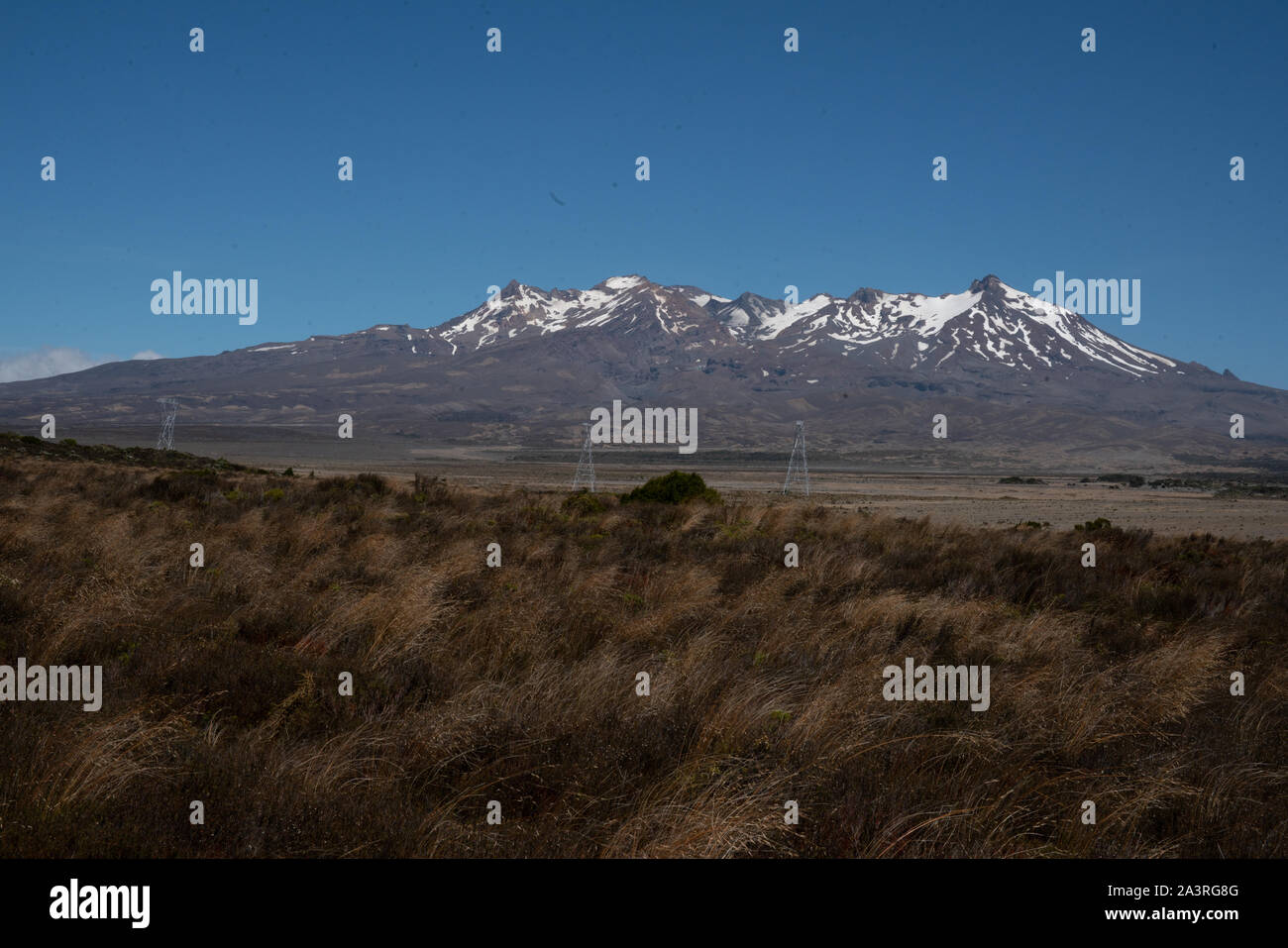 The snow capped volcanic mountains in New Zealand's Desert Road Stock Photo