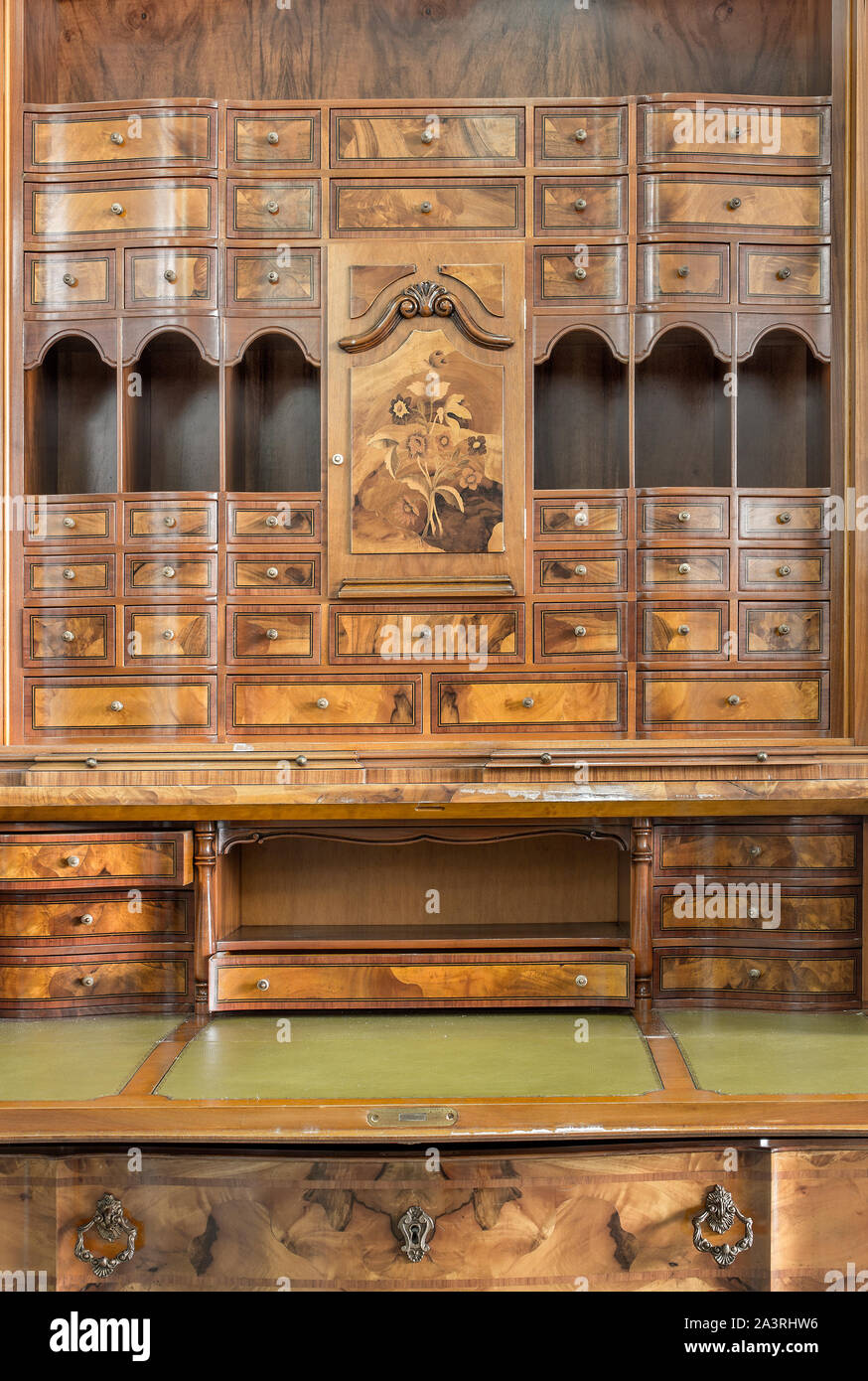 Beautiful old wooden bureau on a white background. Stock Photo