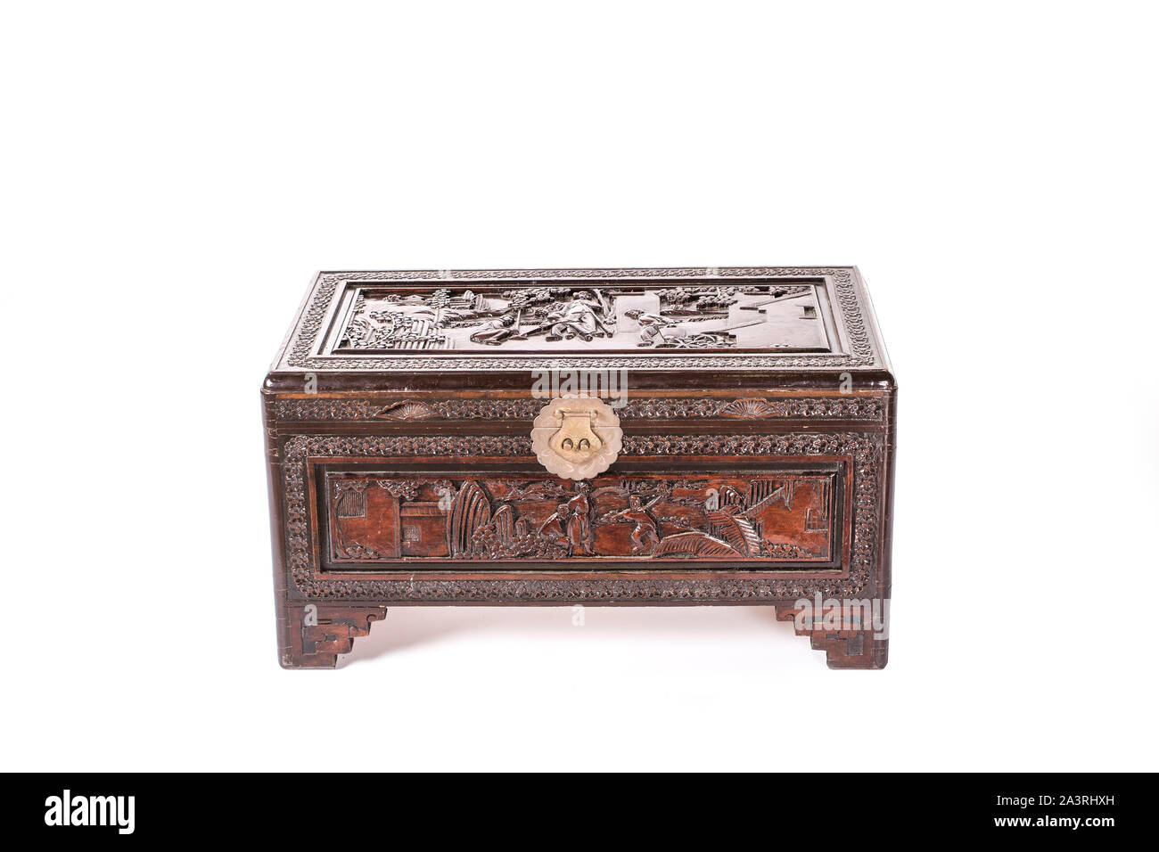 Old wooden chest with beautiful and rich carving decoration in in Chinese style. France Stock Photo