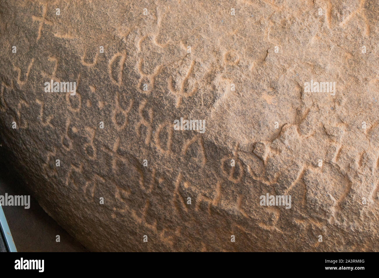 Close up of Inscriptions of Emperor Ashoka inside the cave at Maski, Raichur, India. Stock Photo