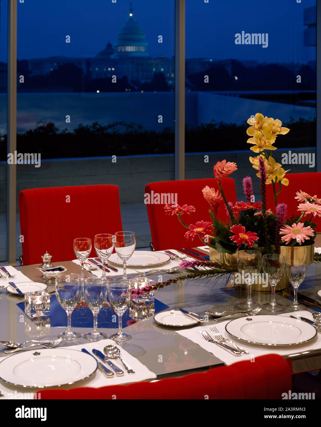 Table setting for a formal diner, with window view of U.S. Capitol, at the Canadian Embassy in Washington, D.C Stock Photo