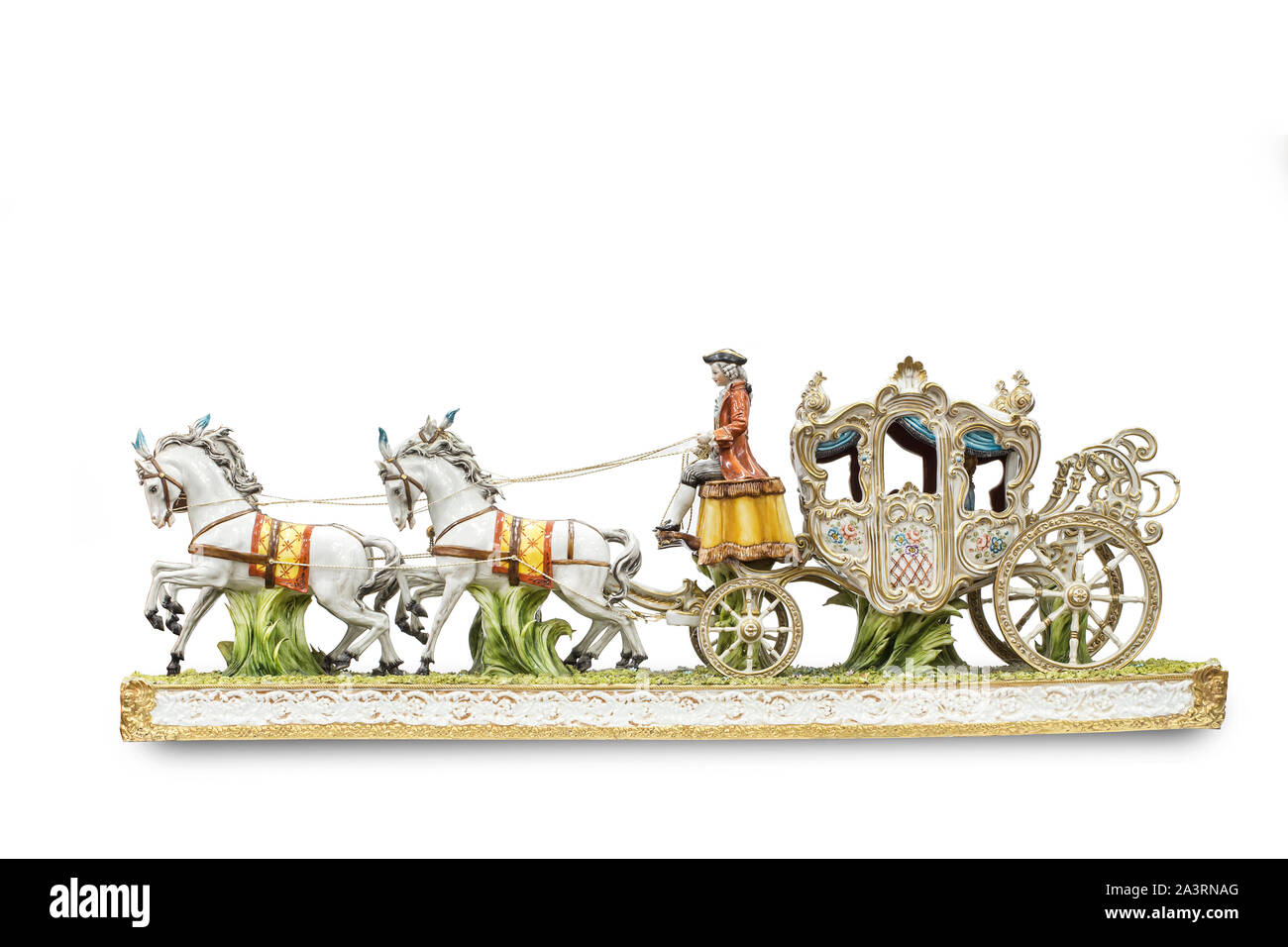 porcelain figurines of horse carriage on white background (with clipping path). Stock Photo