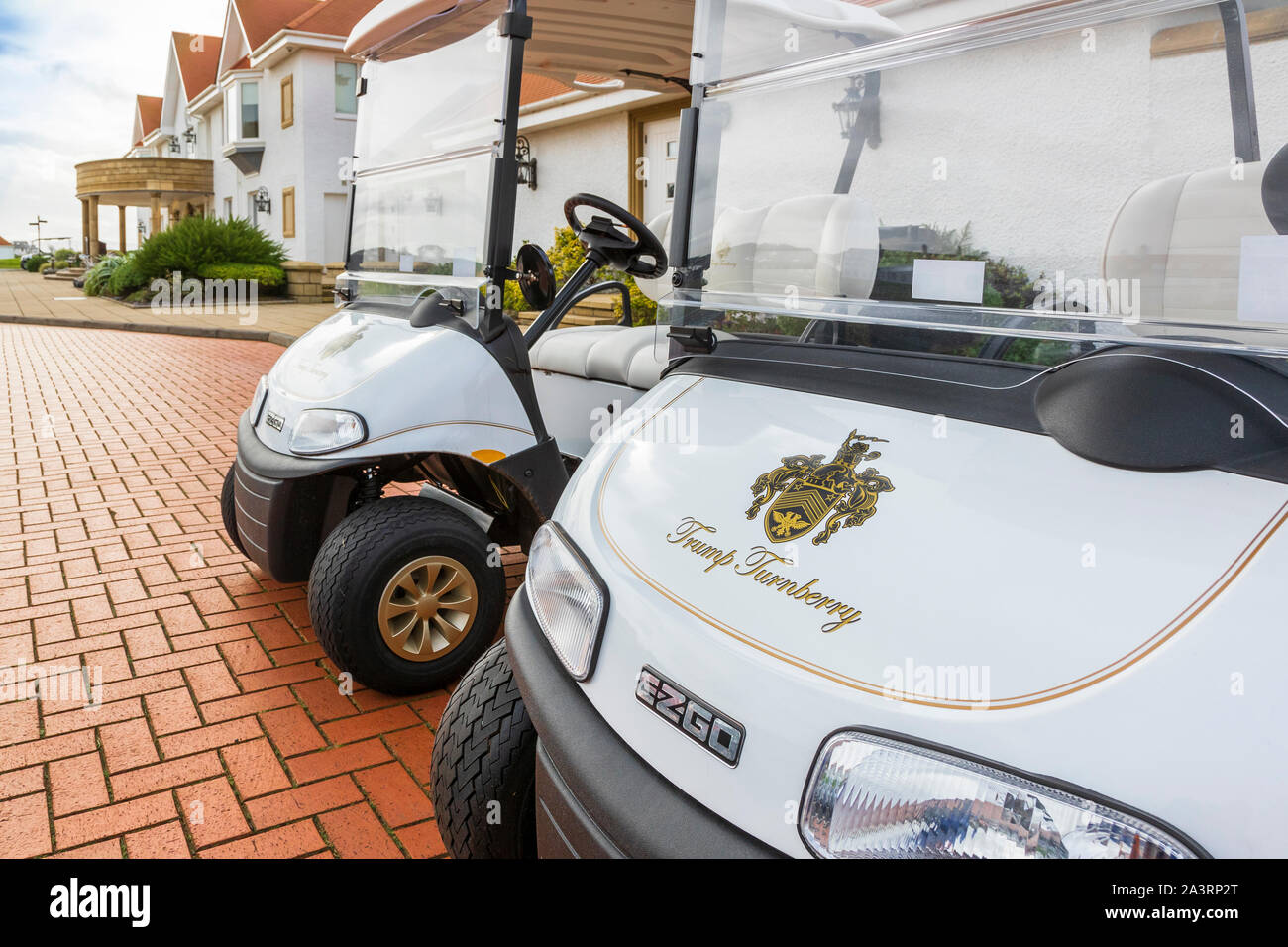 Golf buggies parked outside the clubhouse at Trump Turnberry hotel and golf resort, Turnberry, Ayrshire, Scotland, UK Stock Photo
