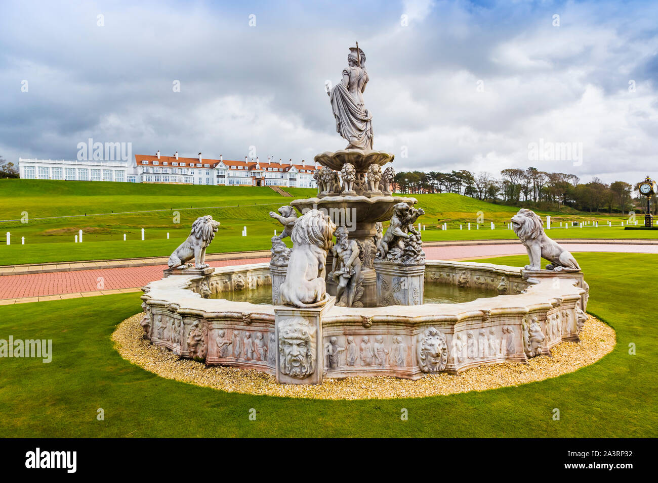 Ornate fountain in the grounds of the clubhouse with a view towards the hotel at Trump Turnberry hotel and golf resort, Turnberry, Ayrshire, Scotland, Stock Photo