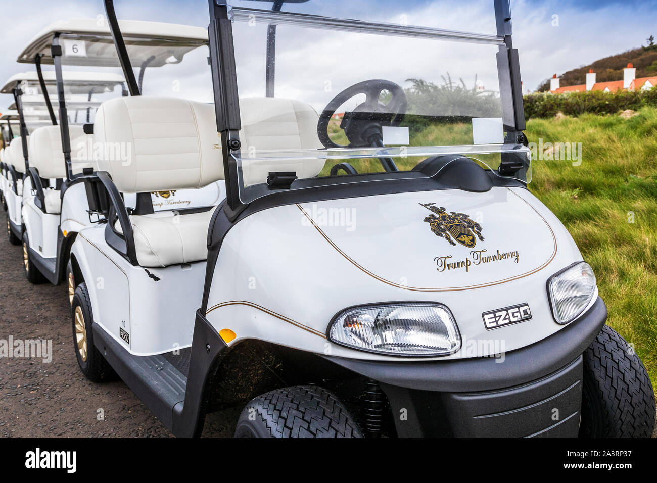 Line of golf buggies at Trump Turnberry Hotel and golf resort, Turnberry, Ayrshire, Scotland, UK Stock Photo