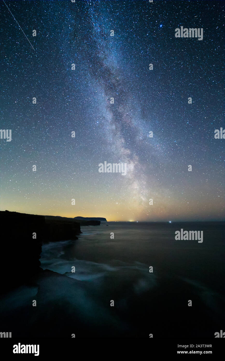 Milky Way band, view from Yesnaby, Orkney Stock Photo