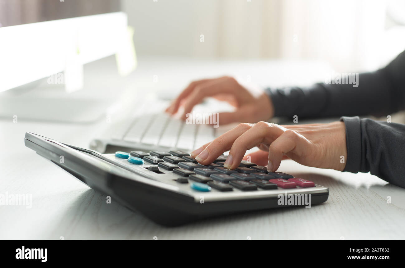 Hand calculator tax hi-res stock photography and images - Alamy