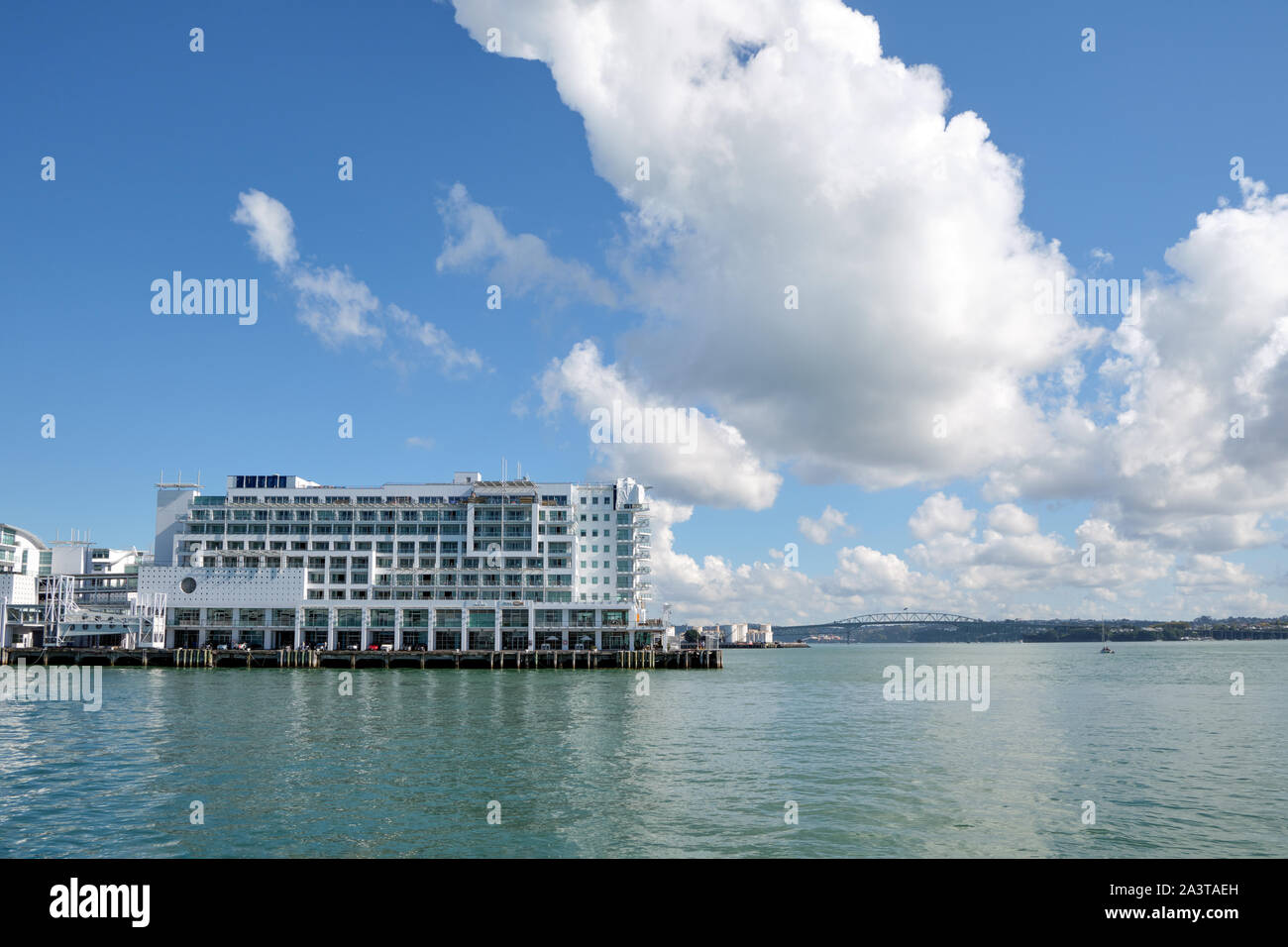 View on the Hilton hotel with Auckland Harbor bridge in the background. Stock Photo