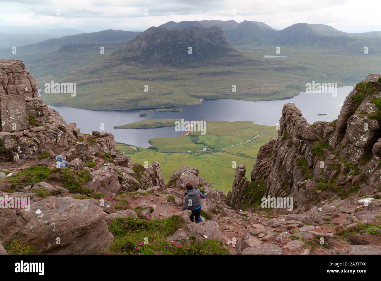 Walkers on Stac Pollaidh, Wester Ross Stock Photo