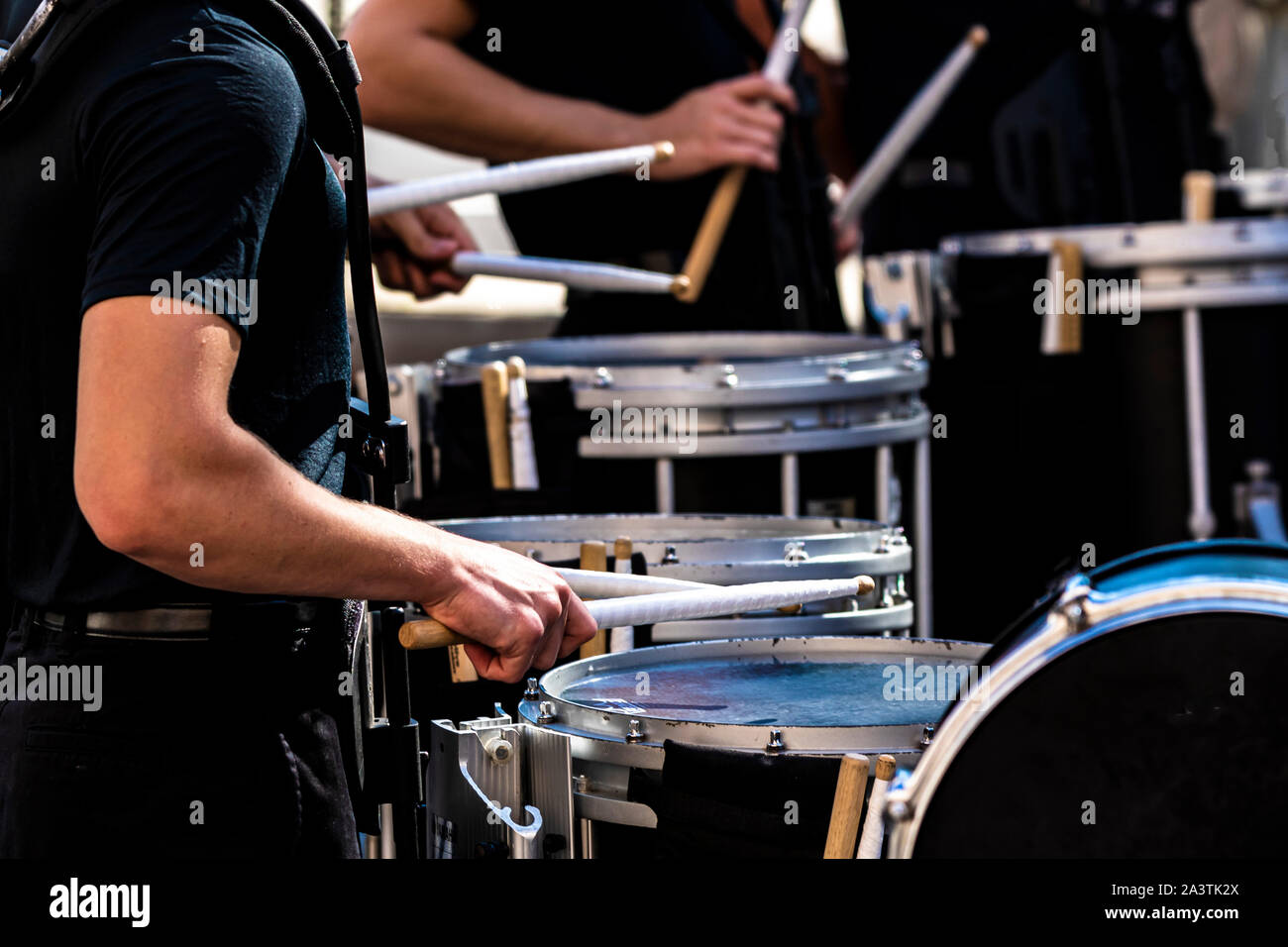 section of a marching band drum line performing Stock Photo Alamy