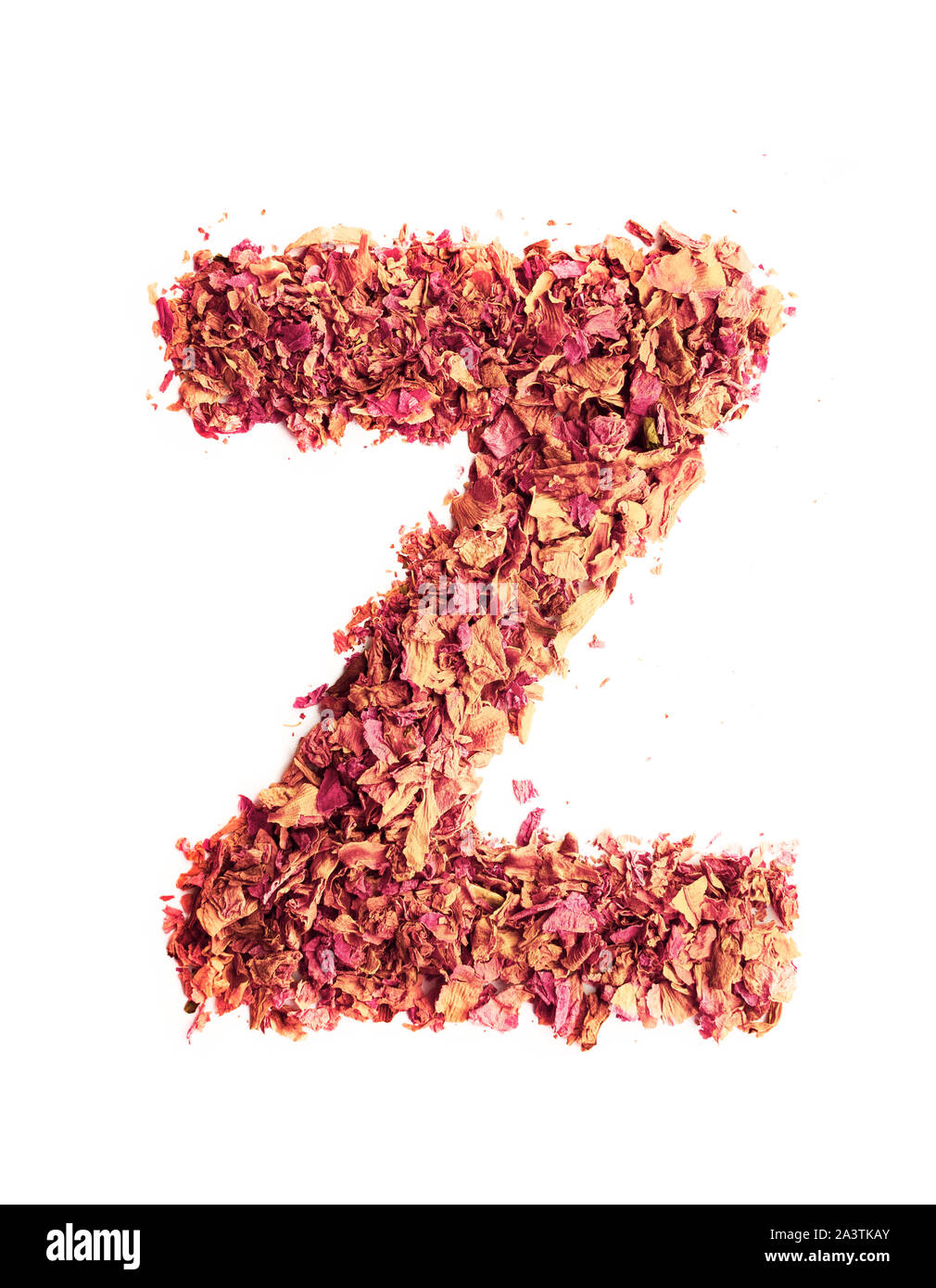Letter Z made of dried rose petals, isolated on white background ...