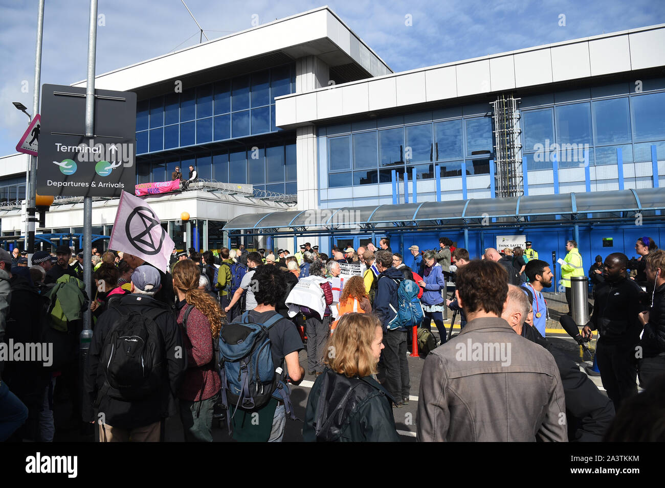 Protesters at City Airport, London, during an Extinction Rebellion climate change protest. Stock Photo