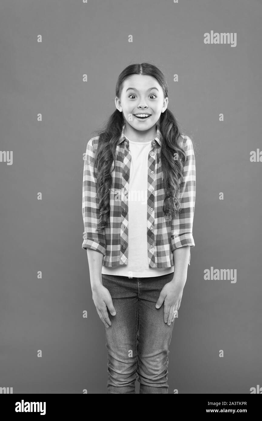 Surprised By Good News Little Girl Orange Background Kid Fashion
