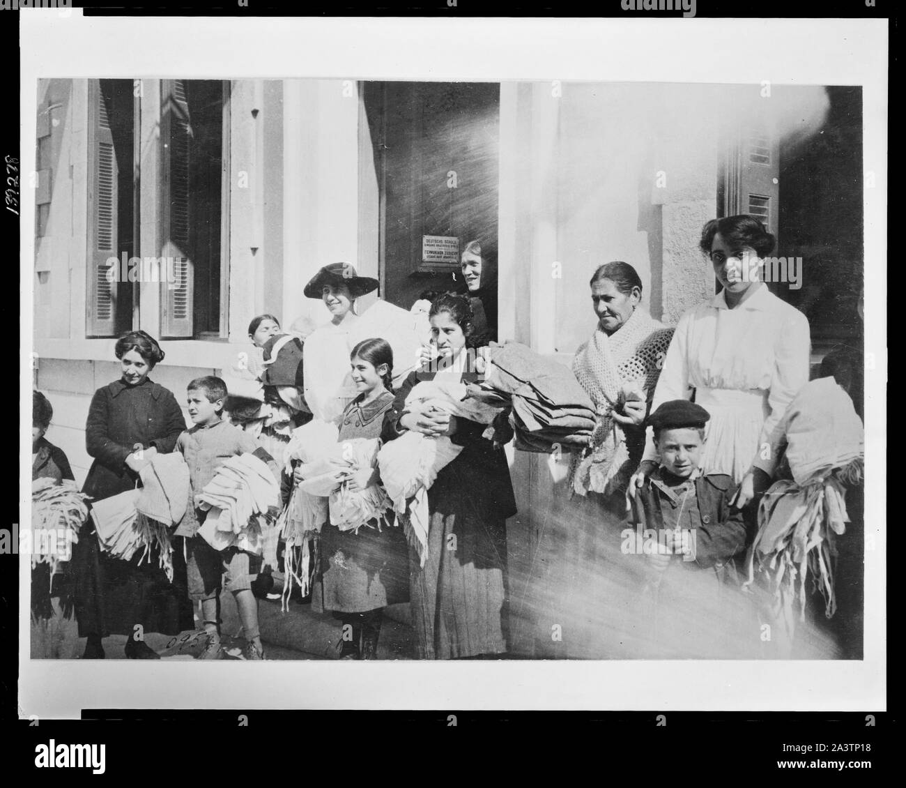 The American sewing circle in Athens A group of Greek women who work in the sewing rooms established by the American Red Cross in the Greek capital. Stock Photo