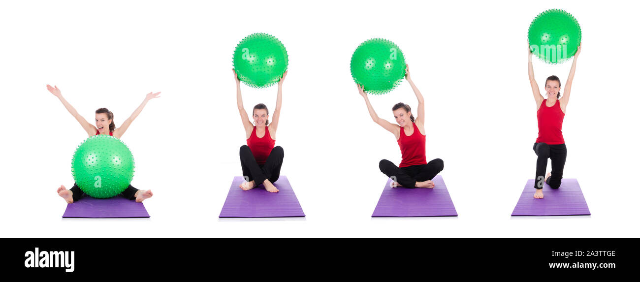 The young woman exercising with swiss ball Stock Photo - Alamy