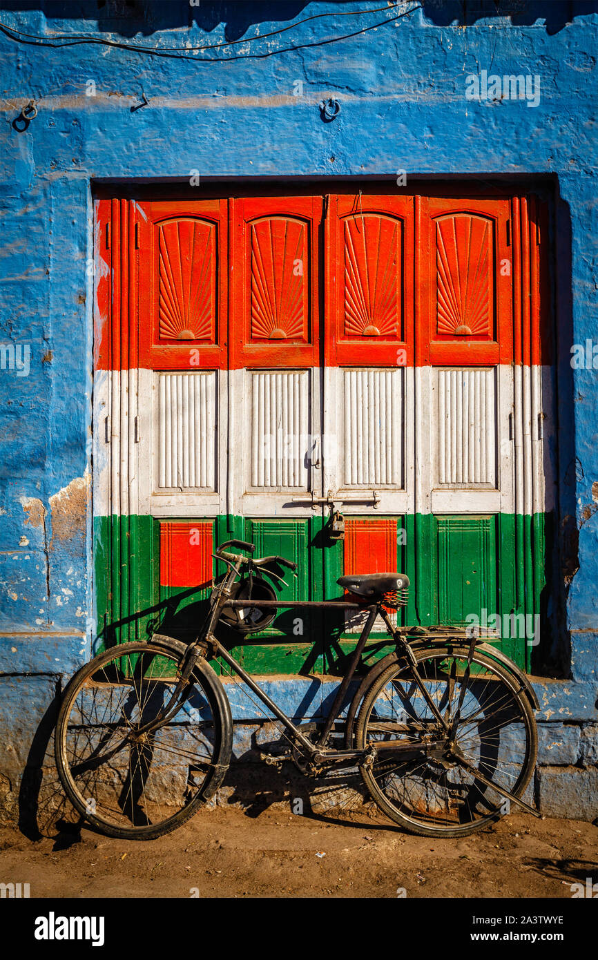 Bicycle and door painted in India national flag colors. Jodhpur, India Stock Photo