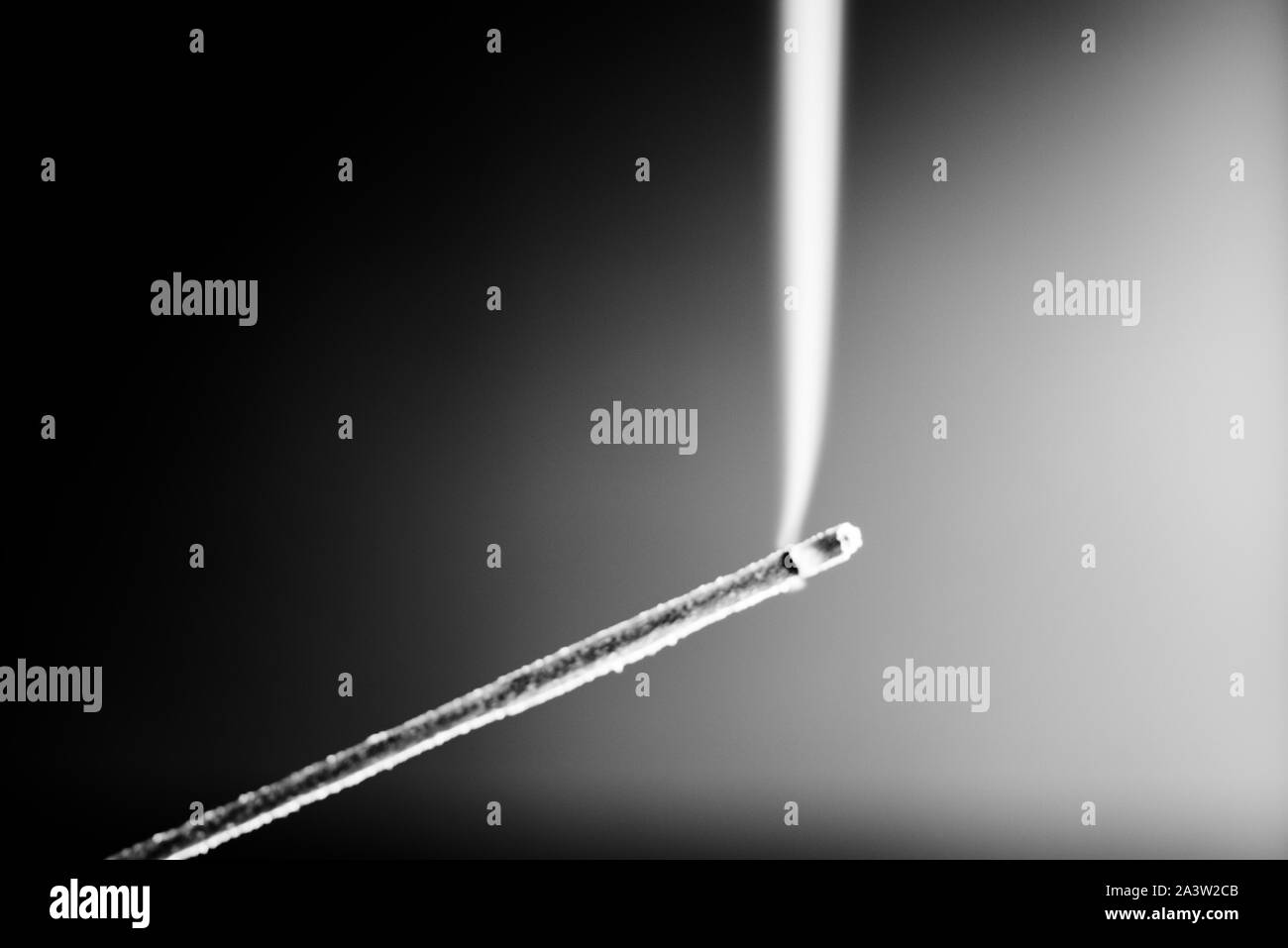 Incense stick-black and white photo Stock Photo - Alamy