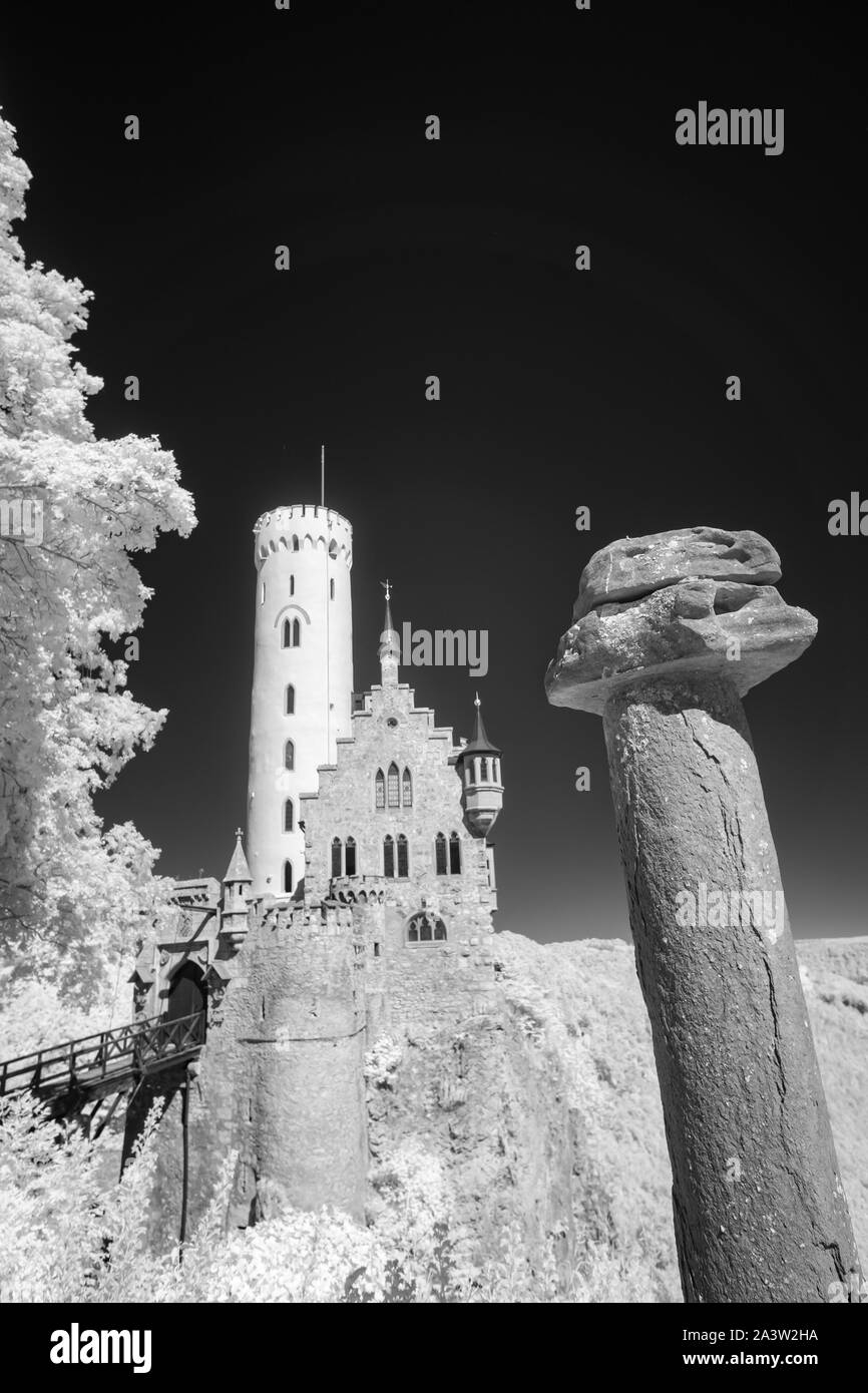 Castle Lichtenstein with rock in black and white infrared Stock Photo