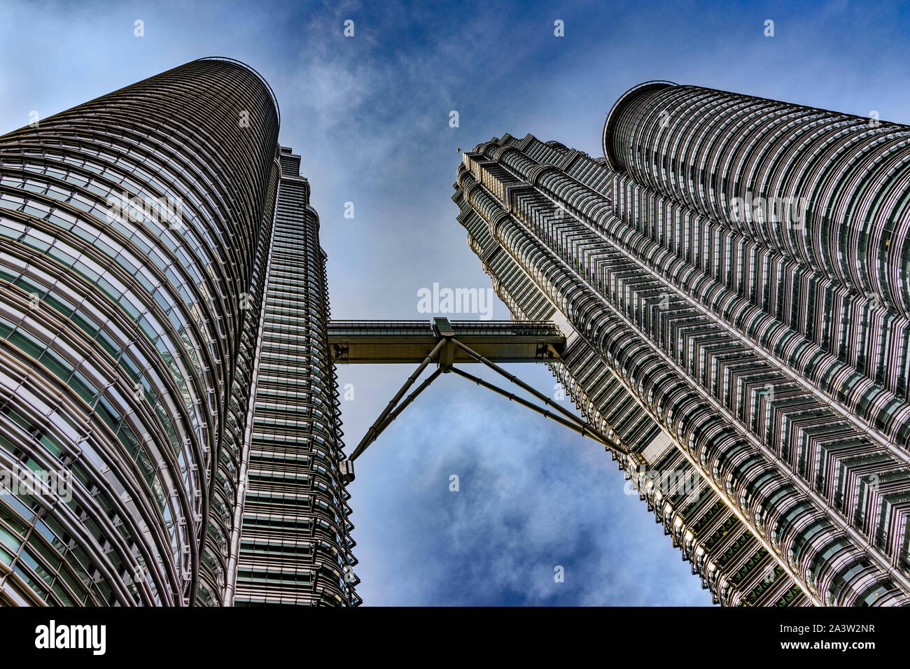Wide Shot Looking Skyward of the Amazing Petronas Twin Towers in Kuala Lumpur, Malaysia. A Modern Marvel. Stock Photo