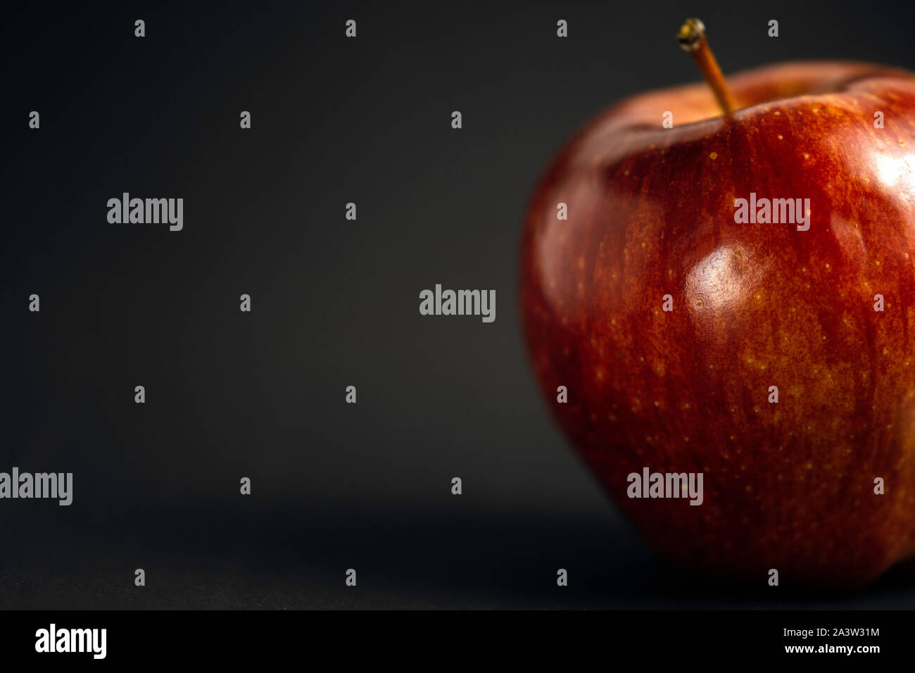Red apple on dark background Stock Photo