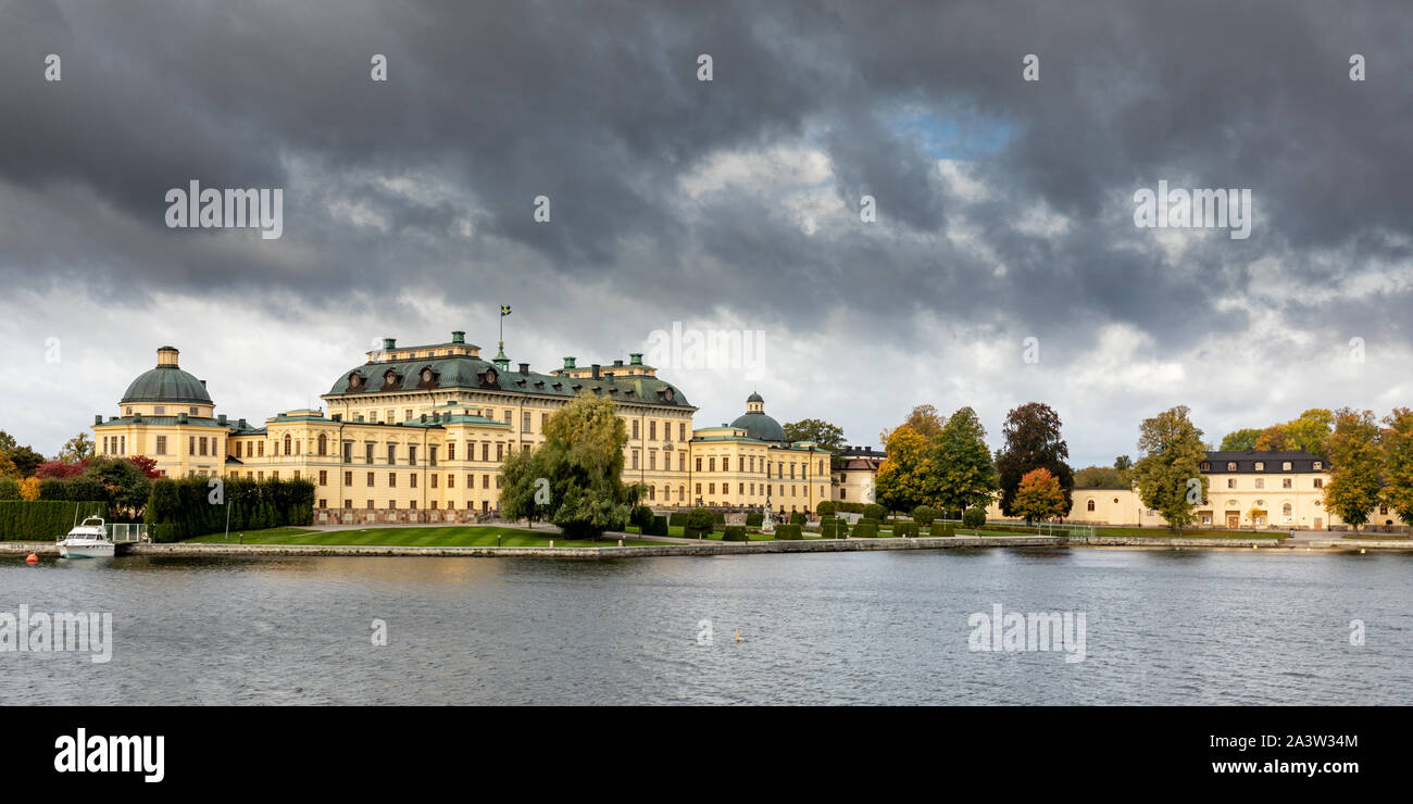 View from tourist boat of Drottningholm Palace, Sweden's royal residence, with lake during autumn. Built on the island Lovön, Stockholm Stock Photo