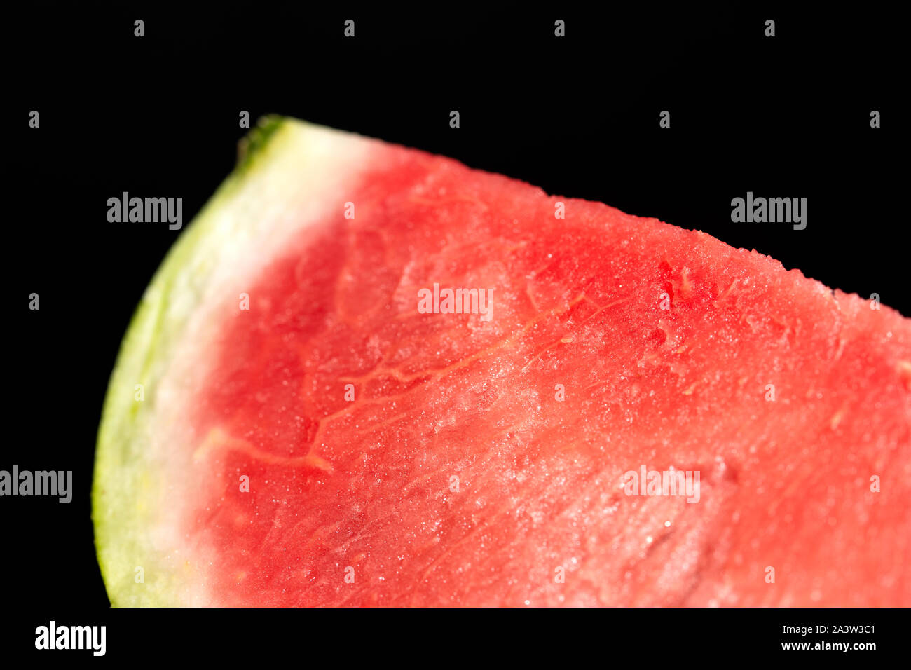 slice of watermelon on black background Stock Photo