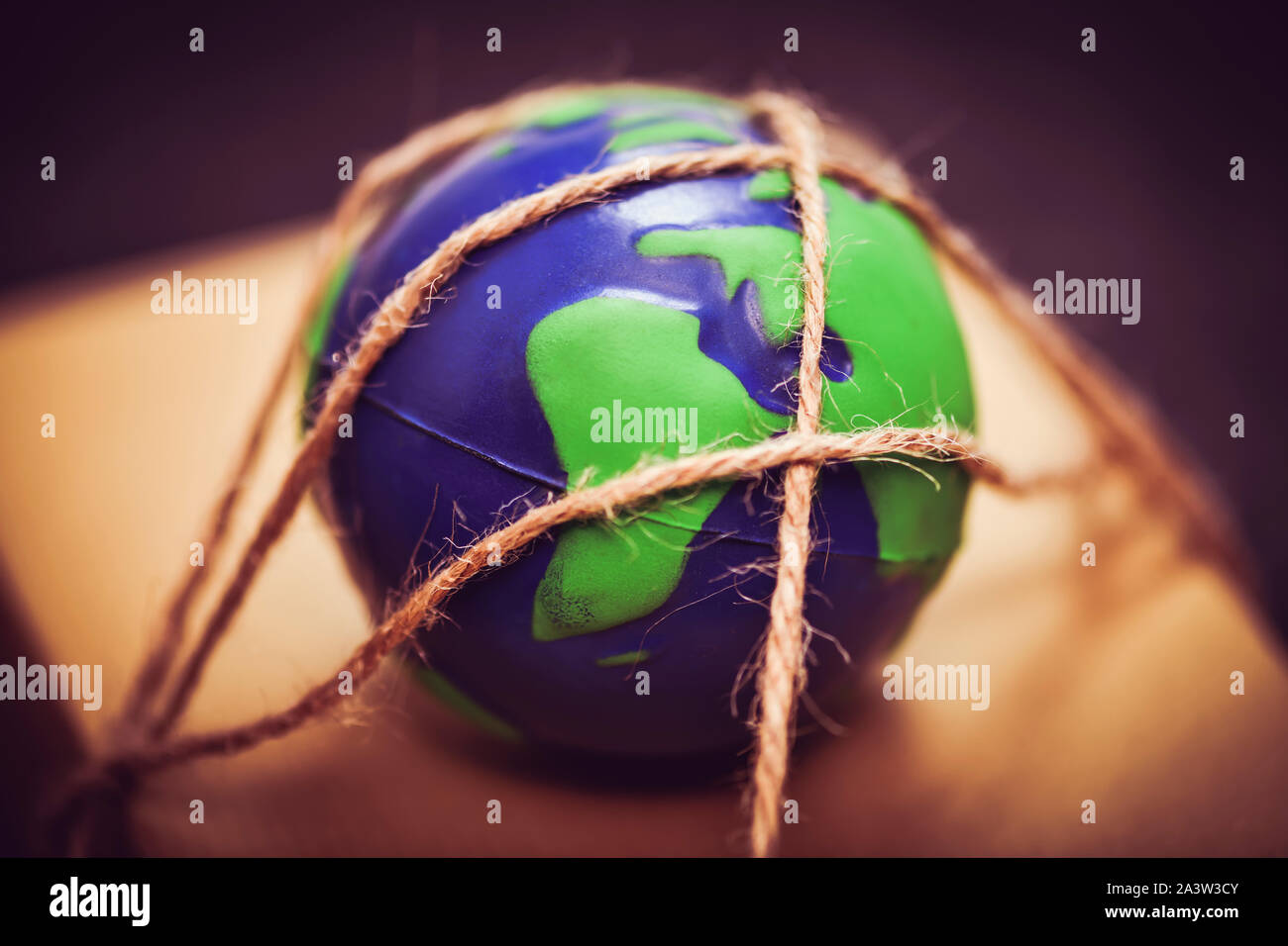 Earth and package, climate policy Stock Photo