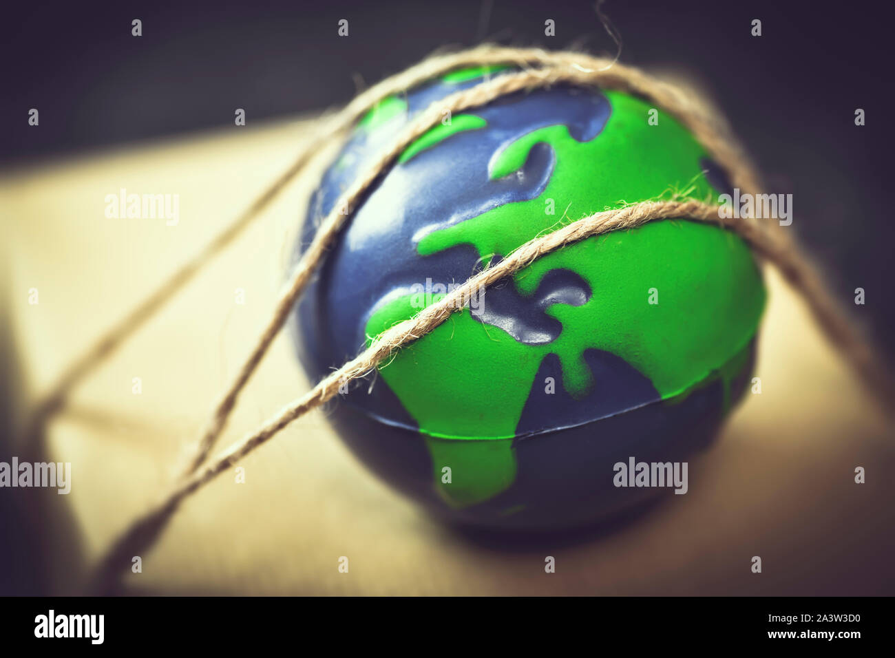 Earth and package, climate policy Stock Photo