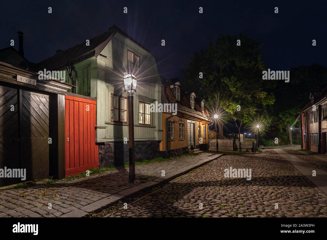 Evening view of traditional old 19th Century houses on Måster Mikaels Gata (Master Michael's street) ,  Södermalm, Stockholm, Sweden. Stock Photo