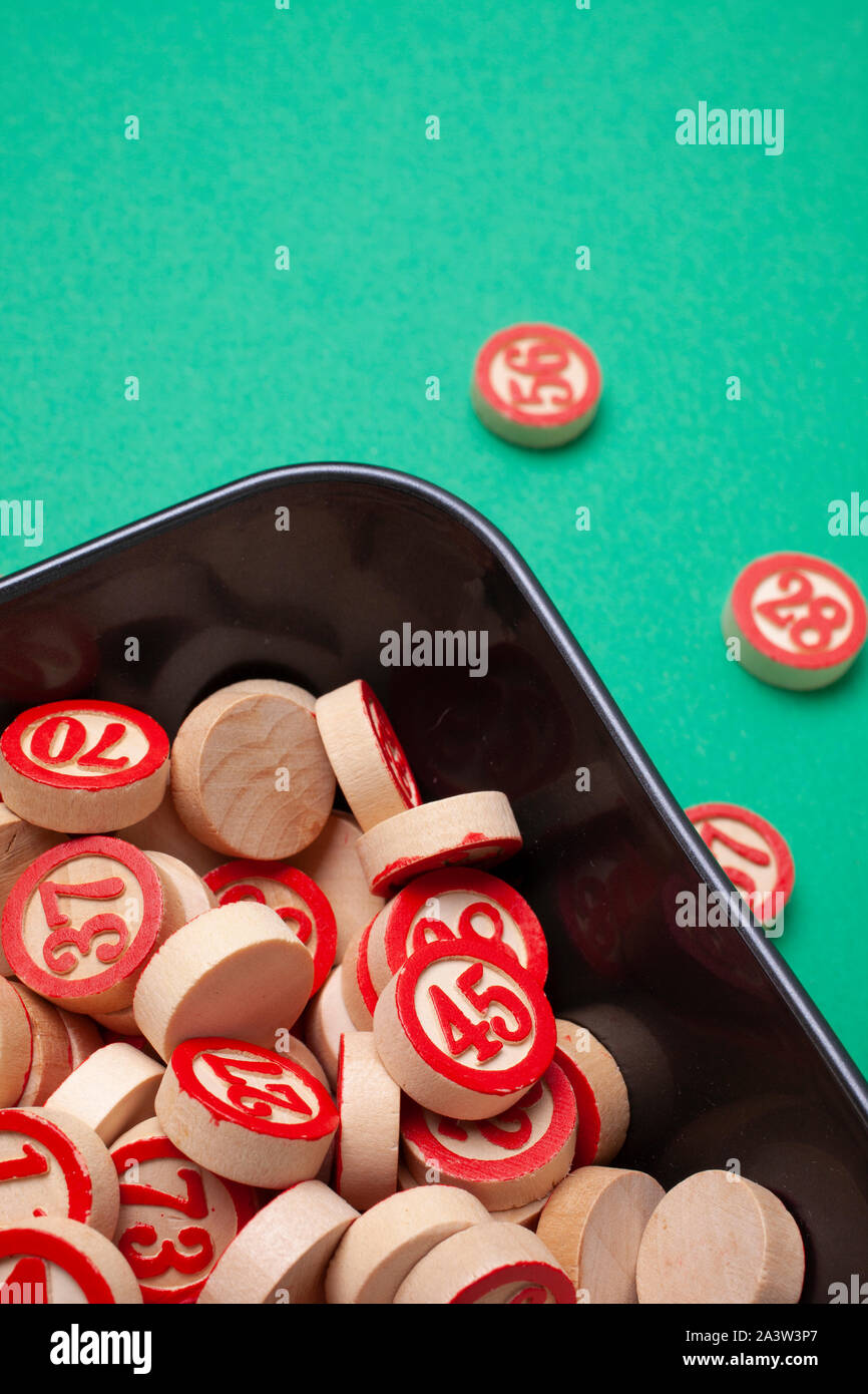 bingo numbers on green table Stock Photo