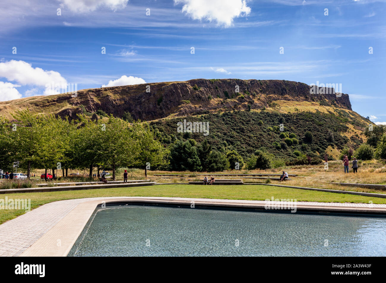 View of Salisbury Crags, Holyrood Park from the Scottish Parliament Building, home of the Scottish Parliament at Holyrood, Edinburgh Stock Photo