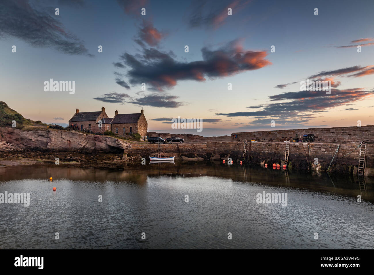Early morning at the picturesque harbour at Cove near Cockburnspath in Berwickshire , Scottish Borders, Scotland ,UK Stock Photo