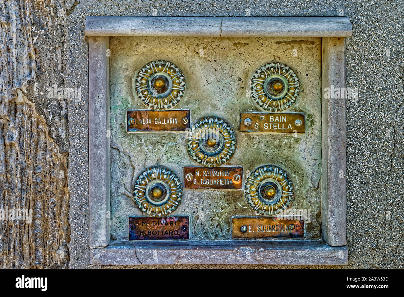 Door bell-pushes on old apartments in Venice, Italy. Stock Photo