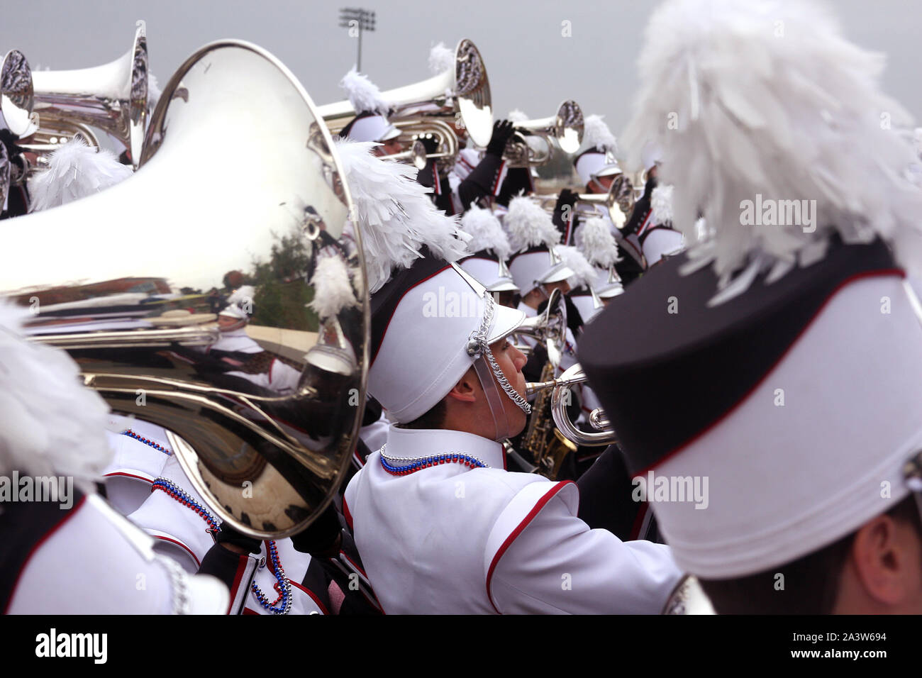 Lynchburg, VA, USA. Liberty University marching band and flag team parading for campus event. Stock Photo