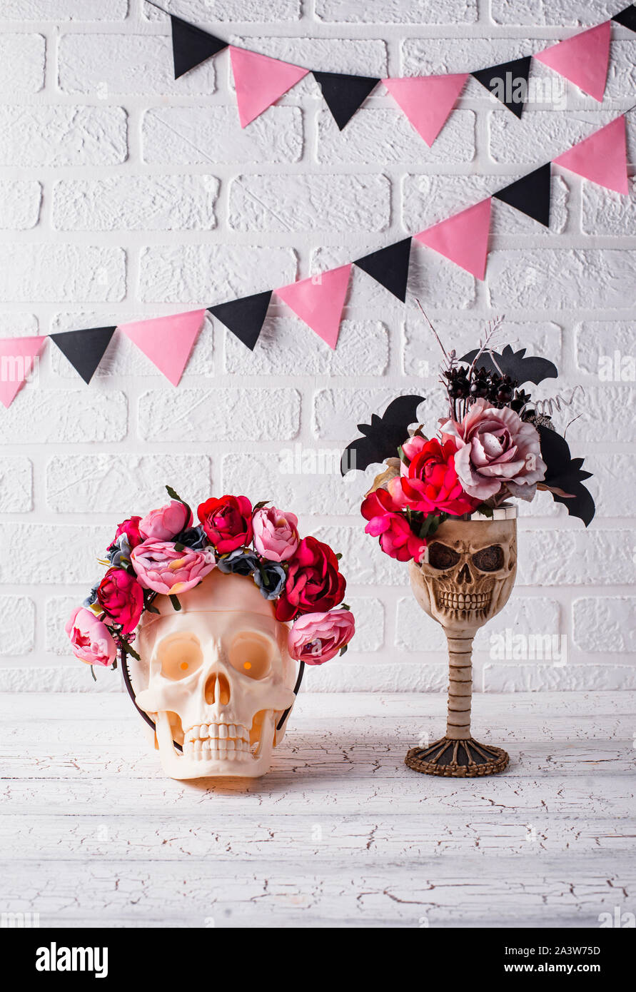 Skull with wreath of pink flowers Stock Photo