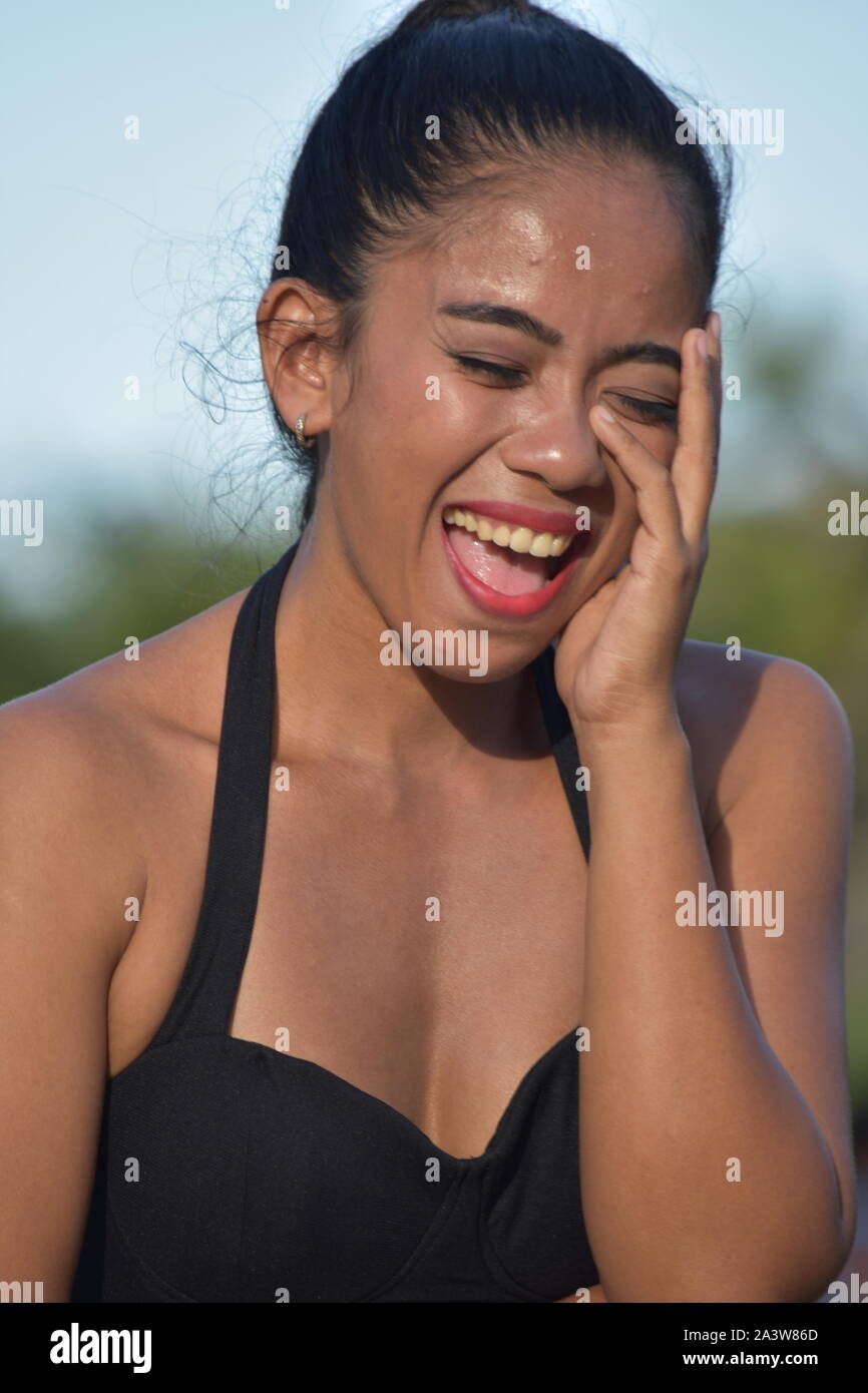 An Asian Woman And Laughter Stock Photo