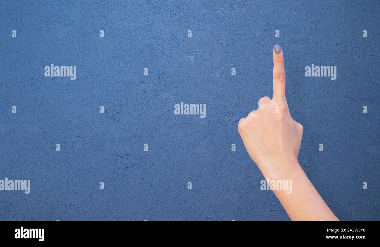 Women holding hand sign on isolated background Stock Photo - Alamy