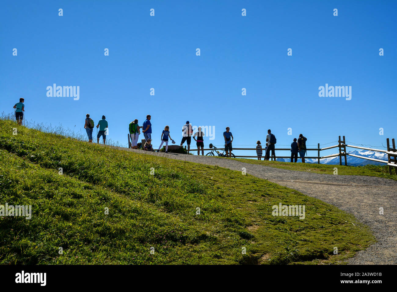 HOCHSOELL, TYROL, AUSTRIA - AUGUST 25, 2016. Tourists looking to the view from Hohe Salve mountain , part of the Kitzbuhel Alps, Austria Stock Photo