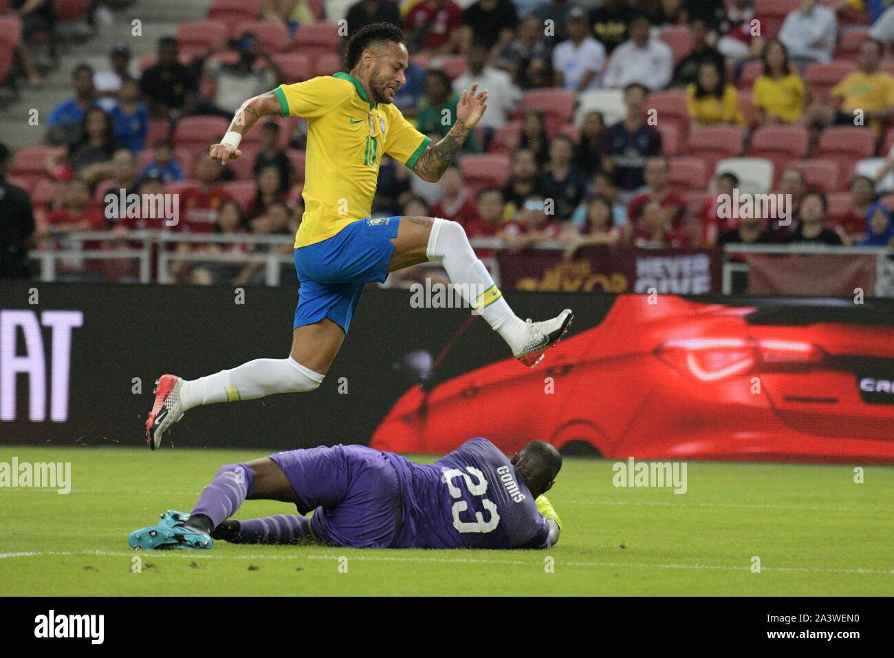 Singapore. 10th Oct, 2019. Neymar(Top) of Brazil competes during the friendly match between Brazil and Senegal held at the National Stadium in Singapore, on Oct 10, 2019. Credit: Photo by Then Chih Wey/Xinhua/Alamy Live News Stock Photo